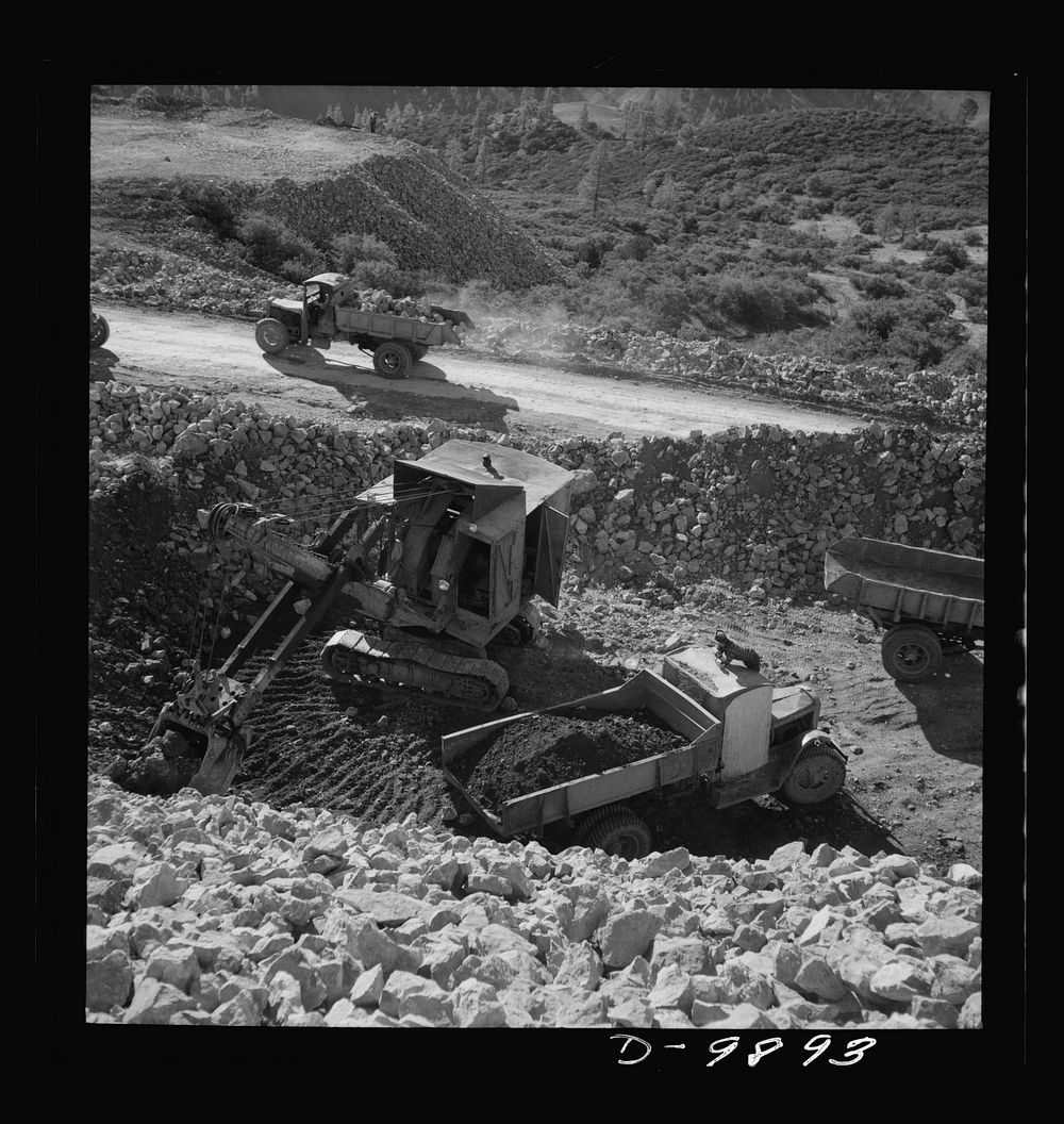 Production. Mercury. A power shovel loading mercury ore from an open-cut mine at the New Idria Quicksilver Mining Company at…