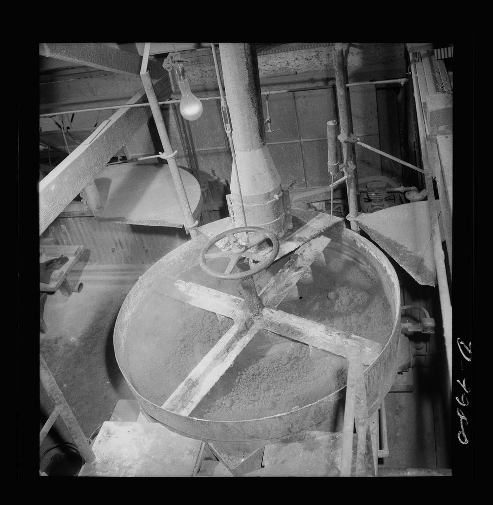 Production. Mercury. Collecting mercury from soot deposited in condenser chamber at a New Idria, California extraction plant…