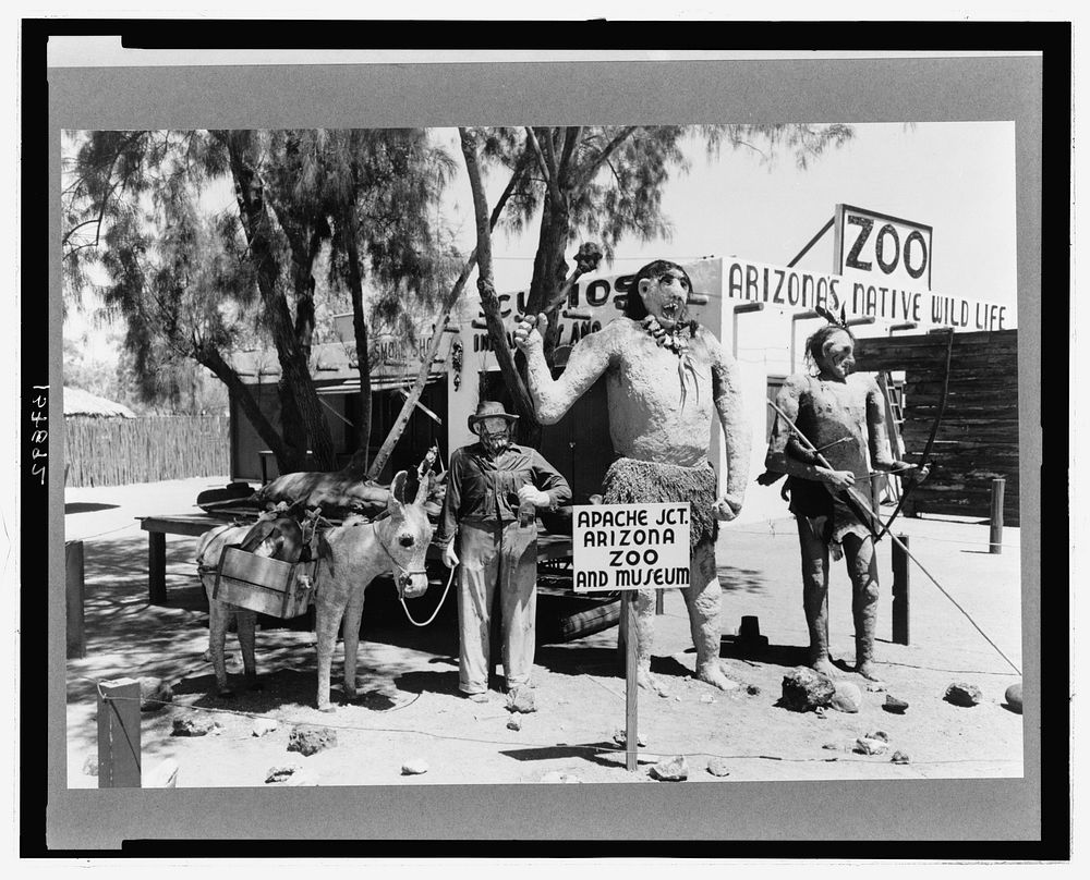 Group of figures made of papier mache which attract passing tourists at Apache Junction, Arizona. These three figures were…