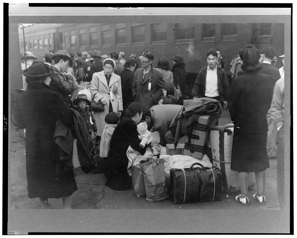 Los Angeles, California. Japanese-American evacuation from West Coast areas under U.S. Army war emergency order. Waiting…