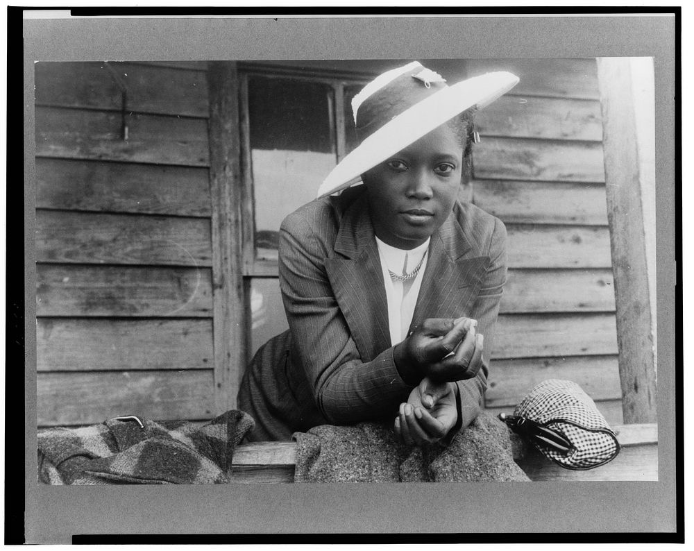 Migratory agricultural worker from Florida waiting to leave Belcross, North Carolina to another job at Onley, Virginia. It…