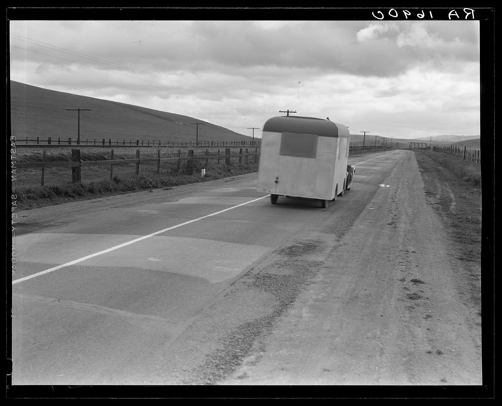 Note on "mobile housing." Car and homemade trailer on U.S. 101 near King City. Man and wife, middle-aged, from Wisconsin to…