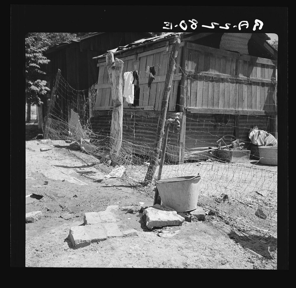 Home of Mexican field worker showing water supply. Brawley, Imperial Valley, California. Sourced from the Library of…