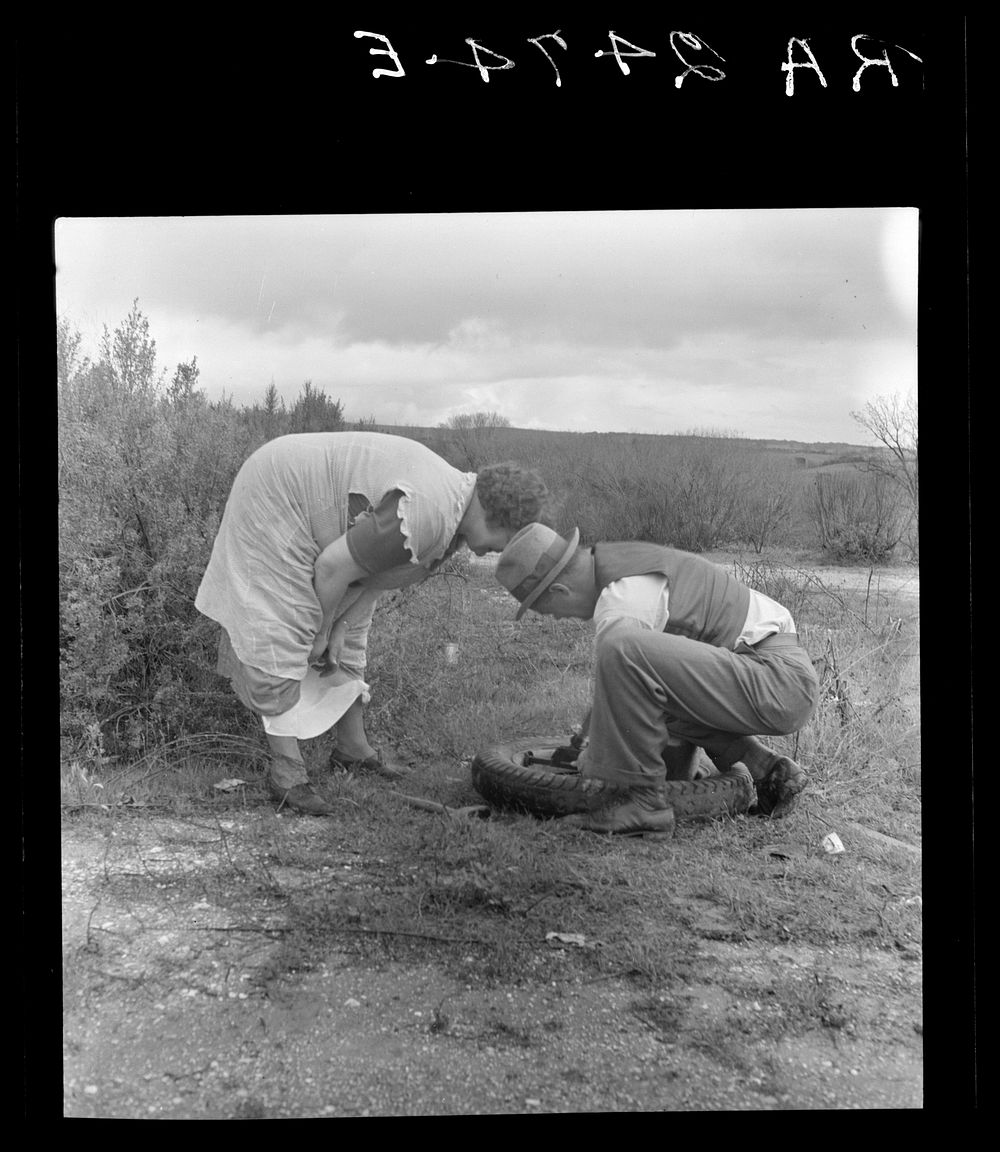 Migrant pea workers on the road with tire trouble. California. Sourced from the Library of Congress.