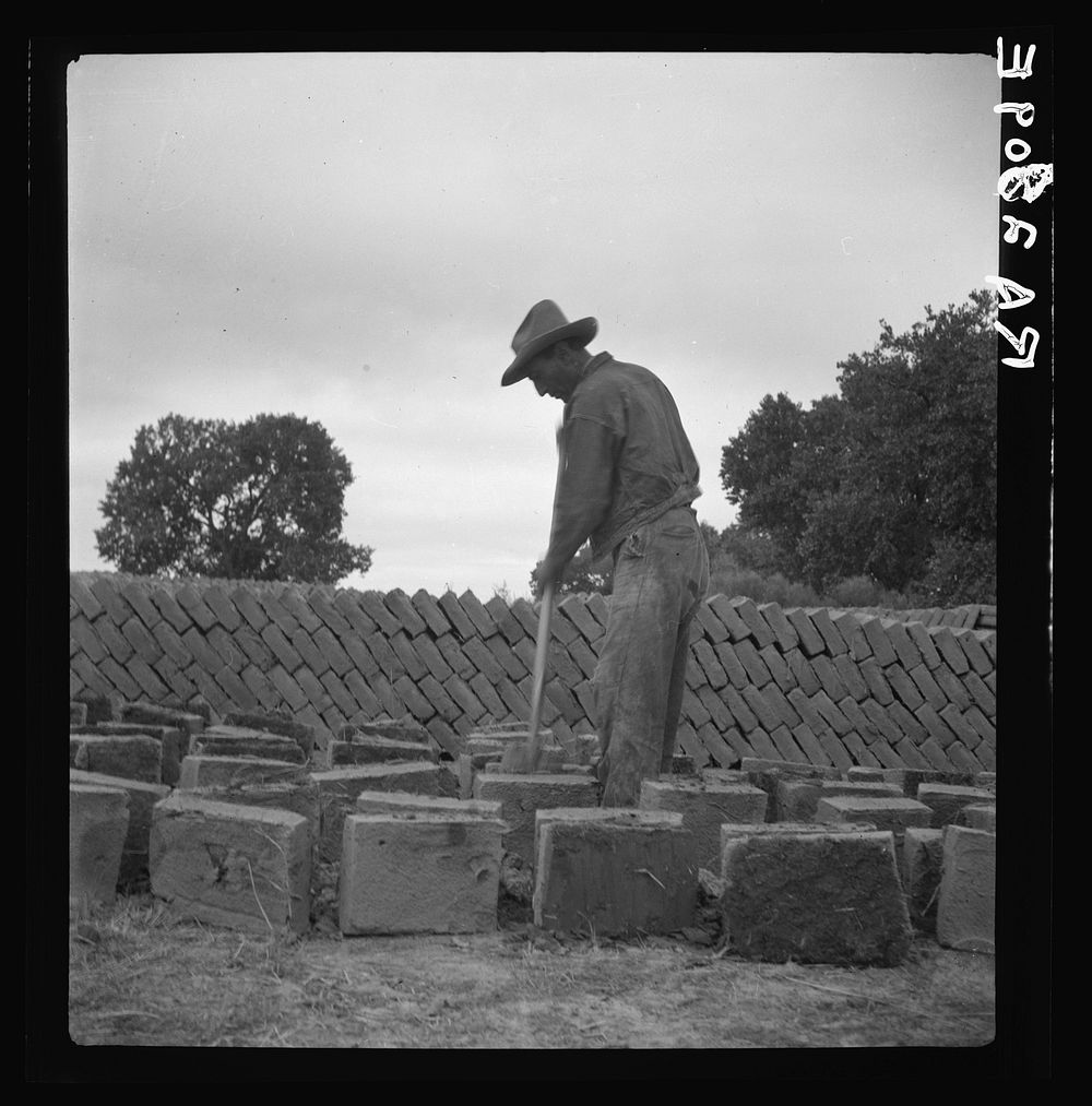 Bosque Farms project. Making adobe brick for school and permanent houses. New Mexico. Sourced from the Library of Congress.
