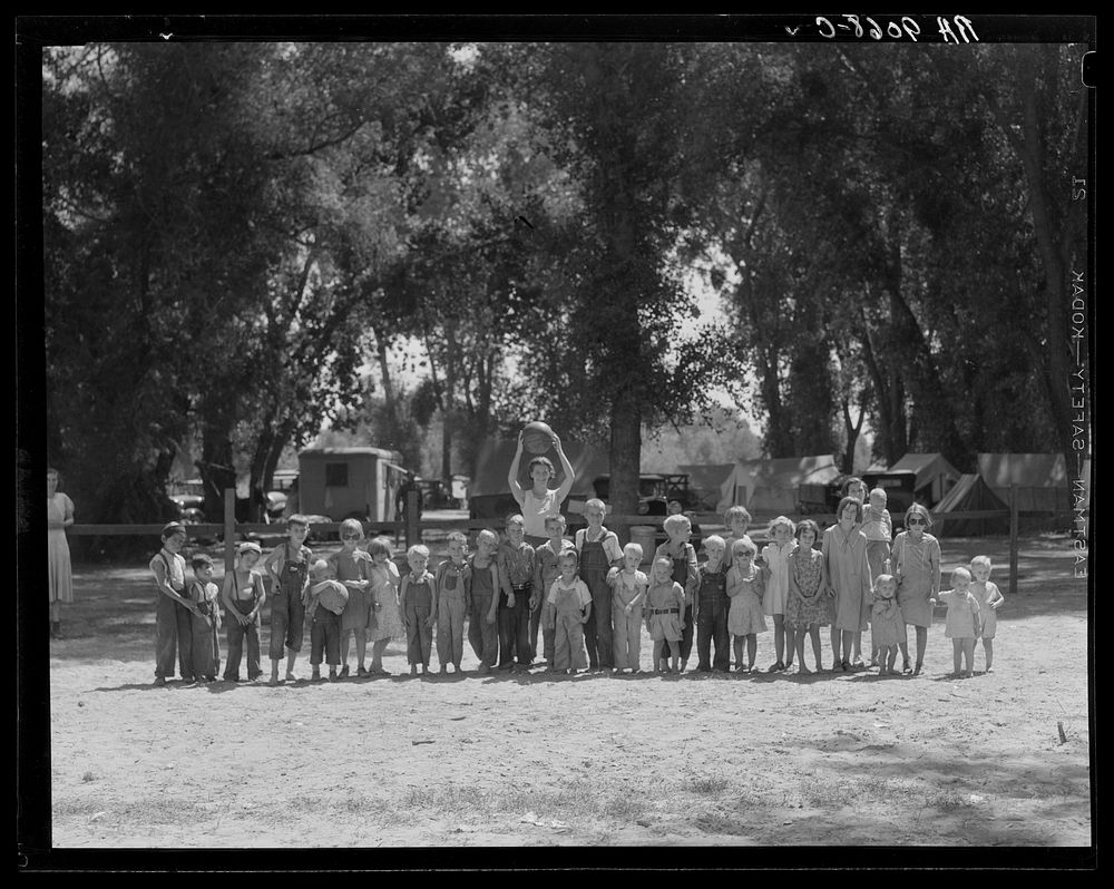 Marysville camp for migrants. Supervised play for the children is part of the child welfare program at the Resettlement…