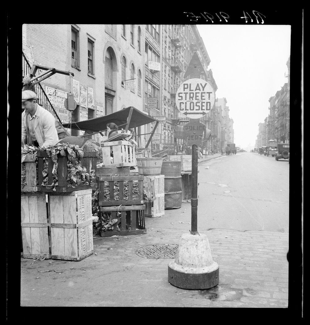 Background photograph for Hightstown project. Play street for children. Sixth Street and Avenue C, New York City. The…