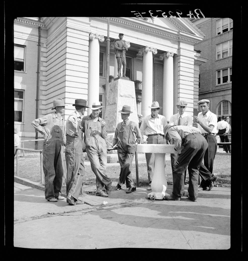 Saturday afternoon in front of the courthouse. Greenville [i.e., Greeneville], Tennessee. Sourced from the Library of…
