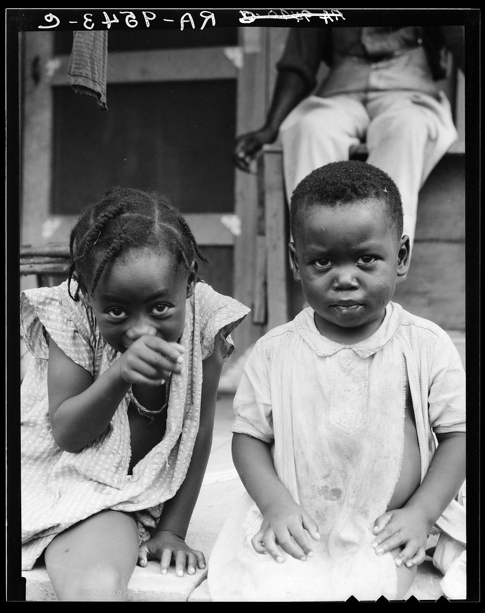 Children of evicted sharecropper, now living on Sherwood Eddy cooperative plantation by Dorothea Lange
