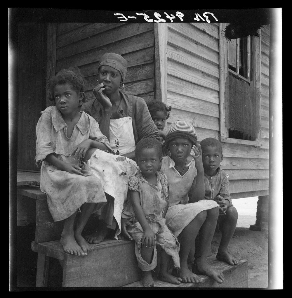 Turpentine worker's family near Cordele, Alabama. Father's wages one dollar a day. This is the standard of living the…