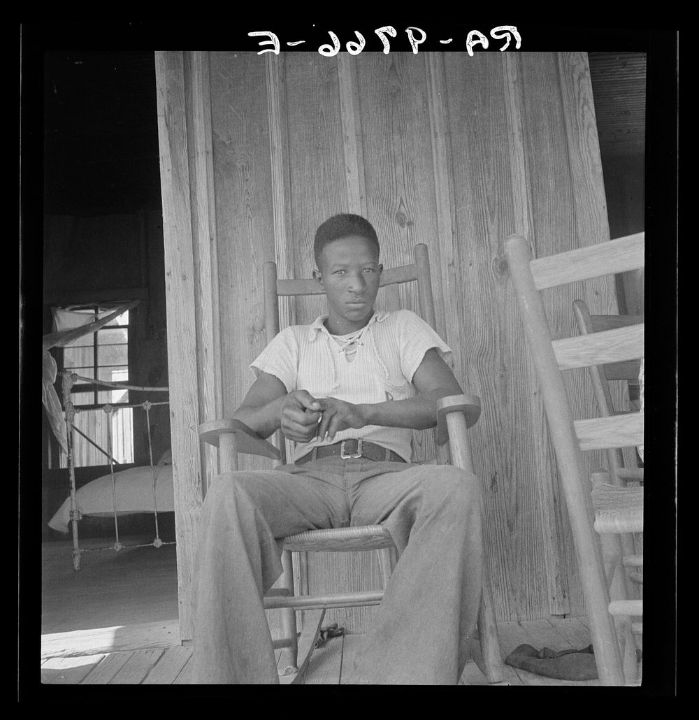 Son of an illiterate sharecropper. He wants a high school education. Near Earle, Arkansas. Sourced from the Library of…