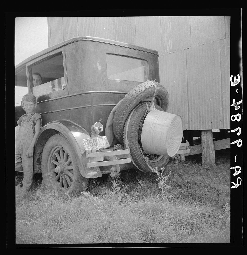Migrant family's car near Brownsville, Texas. Sourced from the Library of Congress.