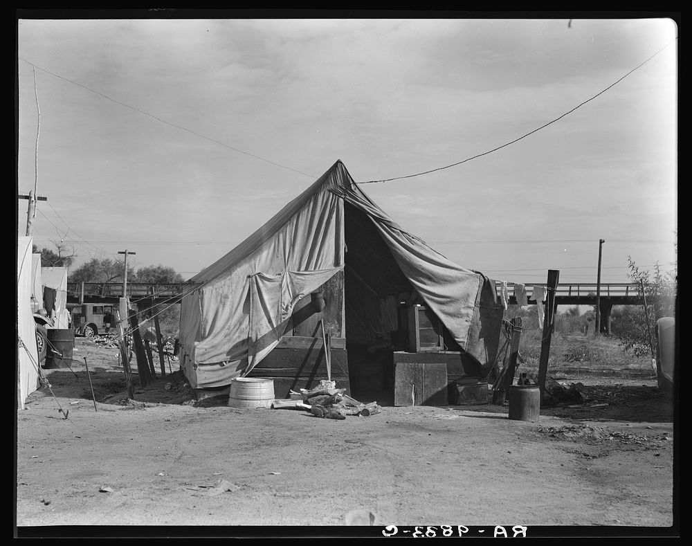 Home of a family of native Californians, migratory workers. Near Porterville, California. Sourced from the Library of…