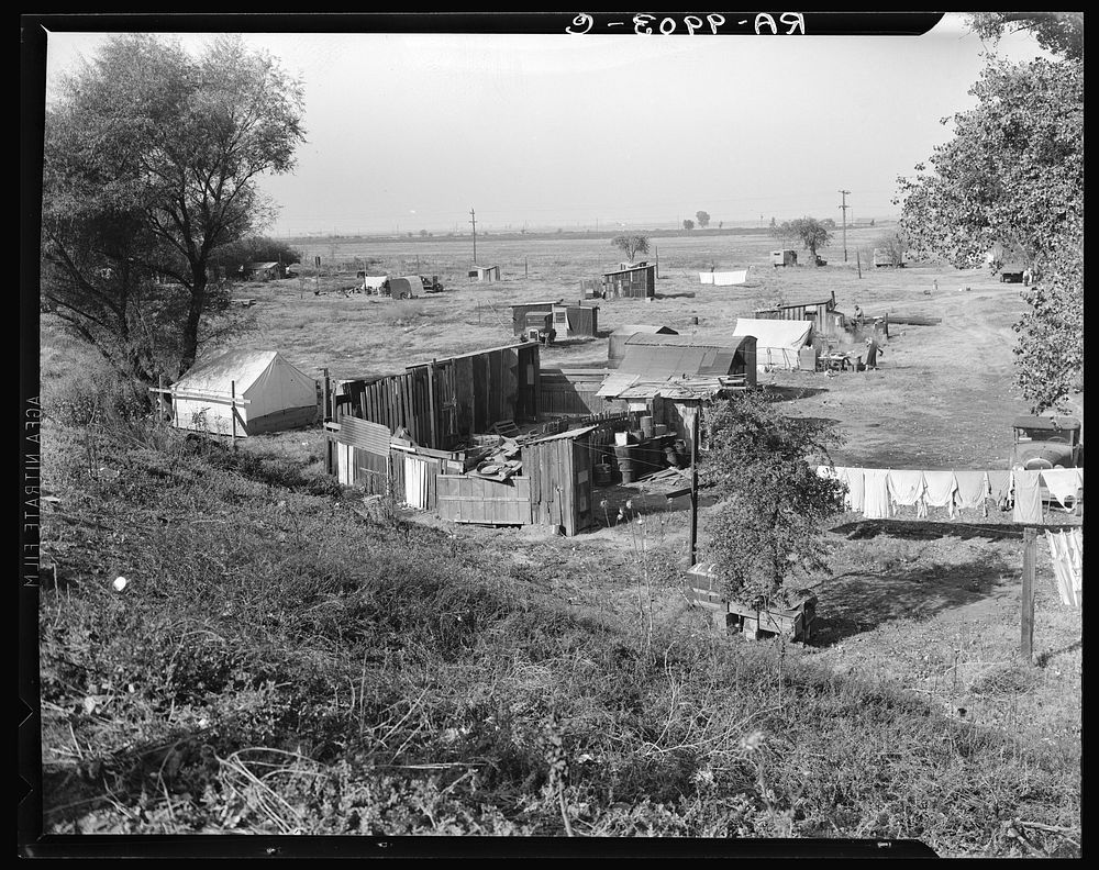 Migrant camp on the outskirts of Sacramento, California on the American River. About thirty families lived on this flat.…