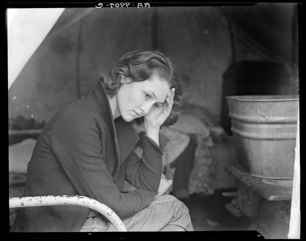 Daughter of migrant Tennessee coal miner. Living in American River camp near Sacramento, California by Dorothea Lange