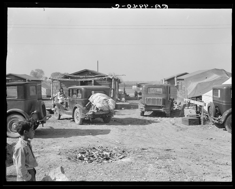 Housing for migratory workers in cotton, five miles north of Corcoran, California. The famous strikers' concentration camp…