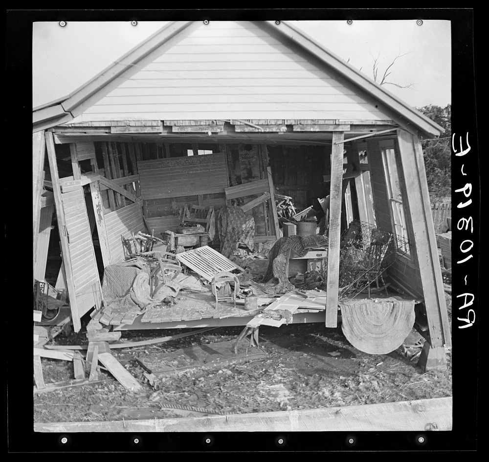 Side of house torn away by flood, showing damaged interior of house. Black Township, Posey County, Indiana by Russell Lee