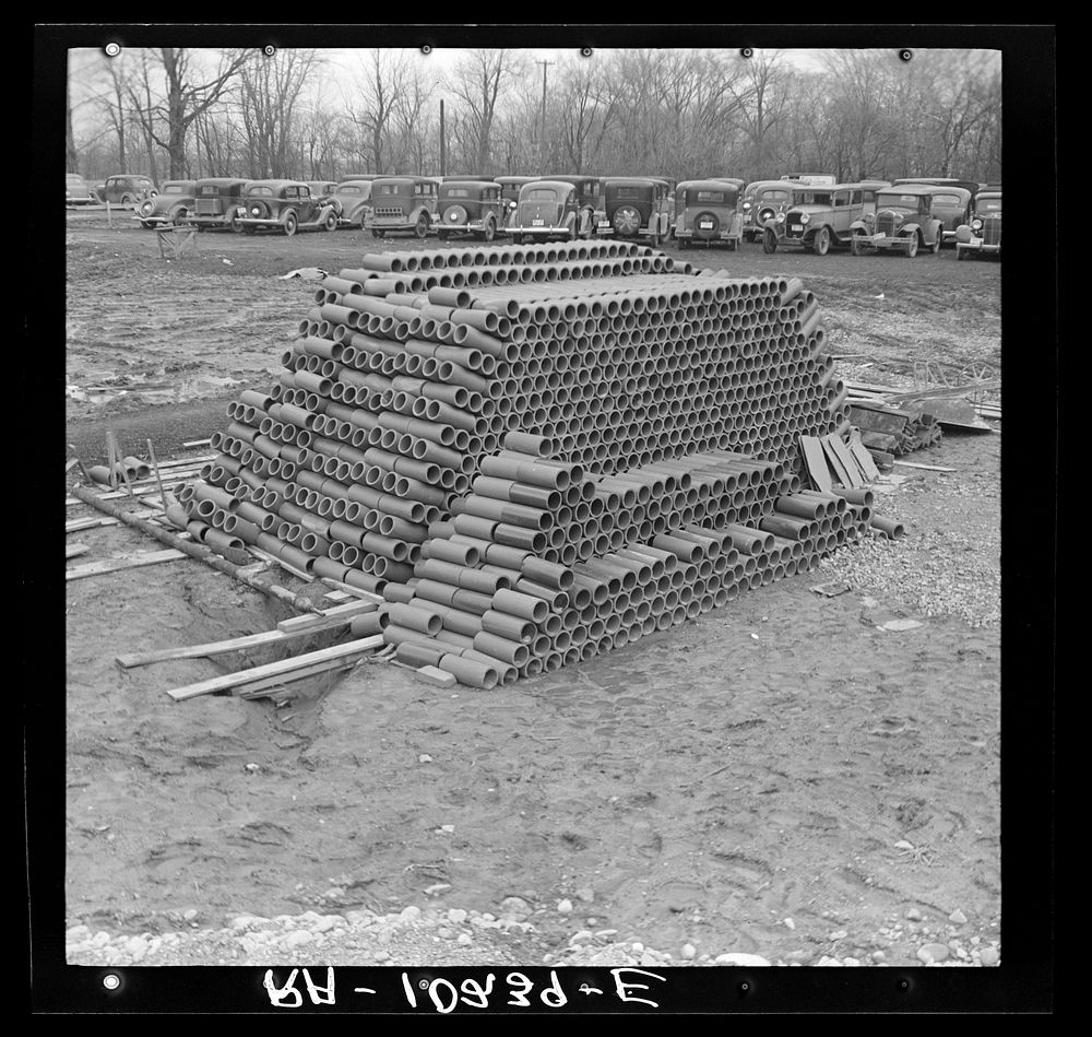 Pile of soil pipe. Greenhills, Ohio by Russell Lee