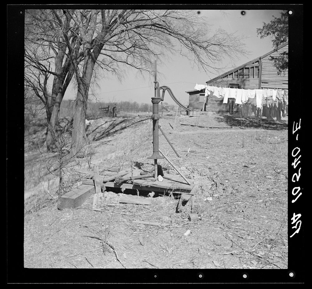 A broken pump on Erasty Emrich's farm near Battle Ground, Indiana. The tenant has to go downhill one hundred yeards from his…