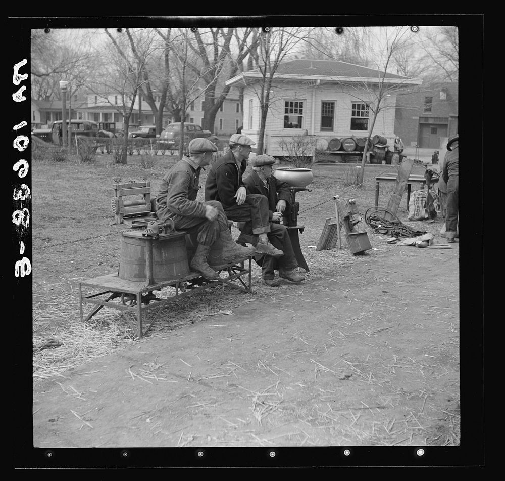 Group of farmers and articles for sale outside the sales pavilion at Aledo, Illinois by Russell Lee