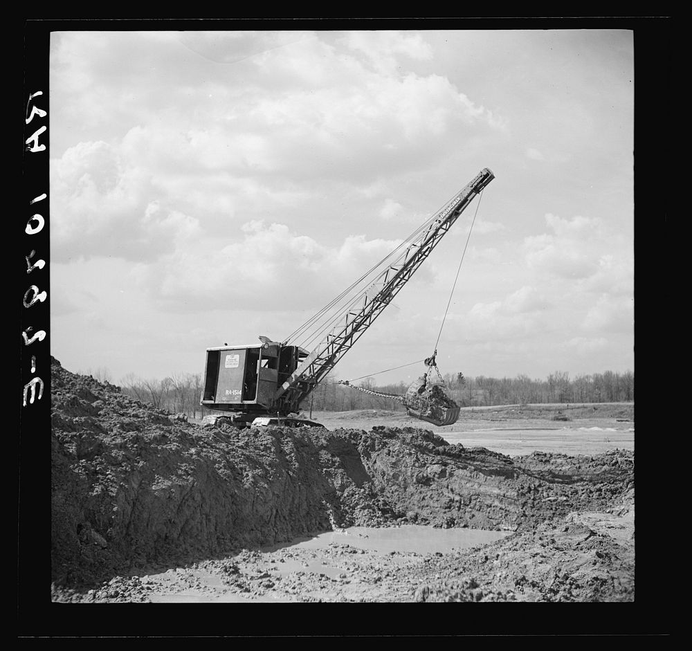 Steamshovel at work on spillway. Martin County development project. Indiana by Russell Lee