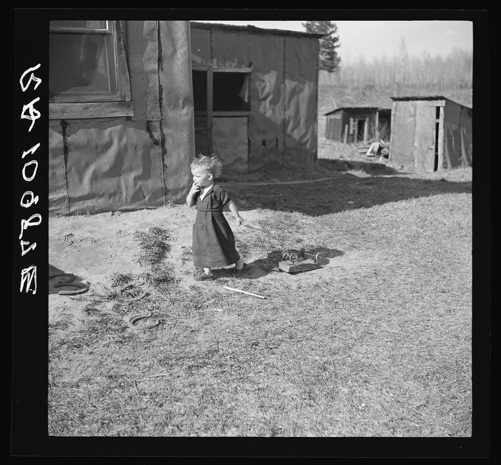 Youngest child of Max Sparks. Near Long Lake, Wisconsin. She is a deaf mute by Russell Lee
