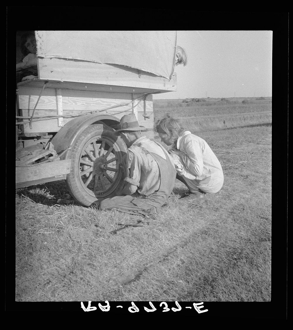 [Untitled photo, possibly related to: Family between Dallas and Austin, Texas. The people have left their home and…