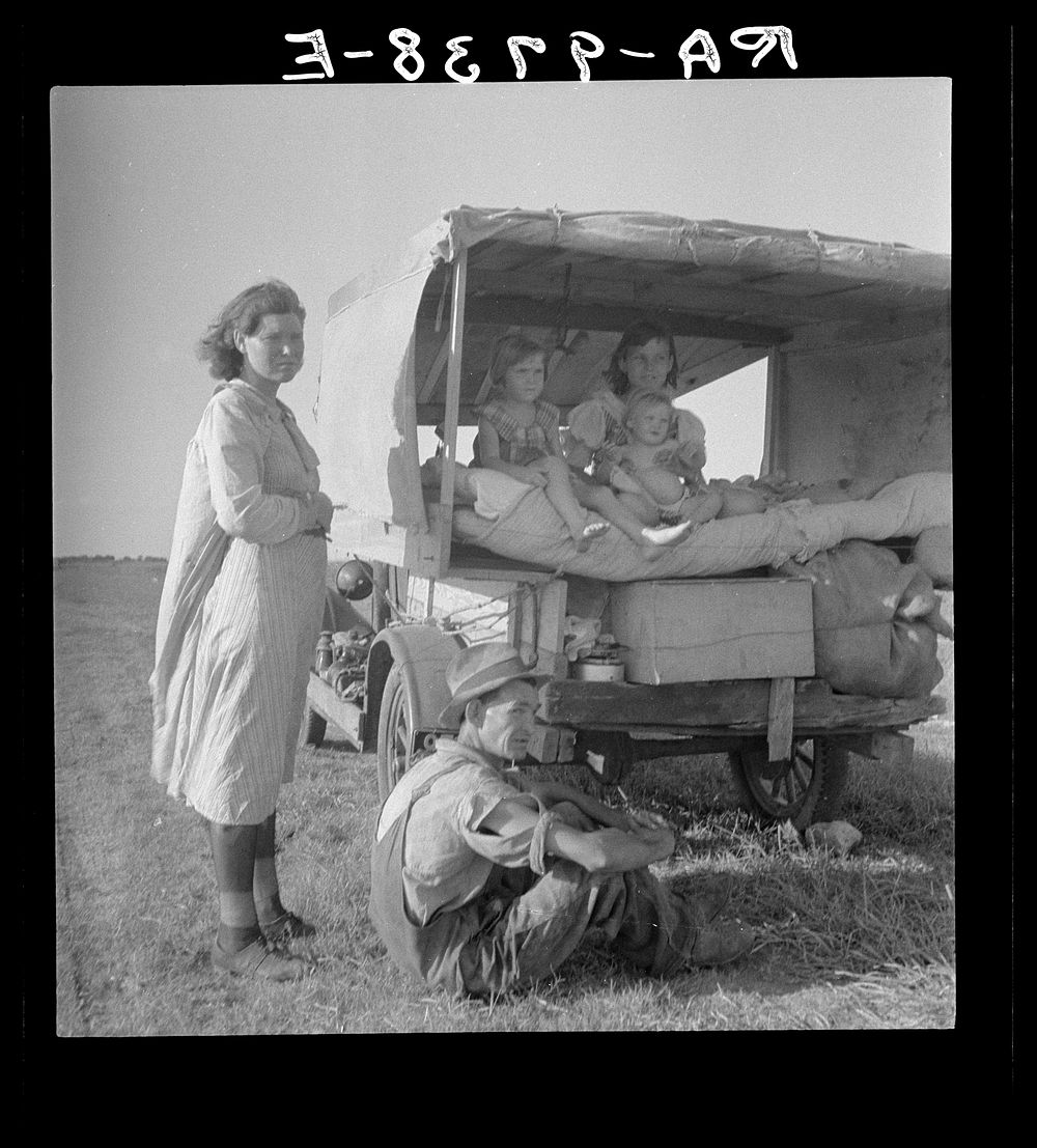 [Untitled photo, possibly related to: Family between Dallas and Austin, Texas. The people have left their home and…