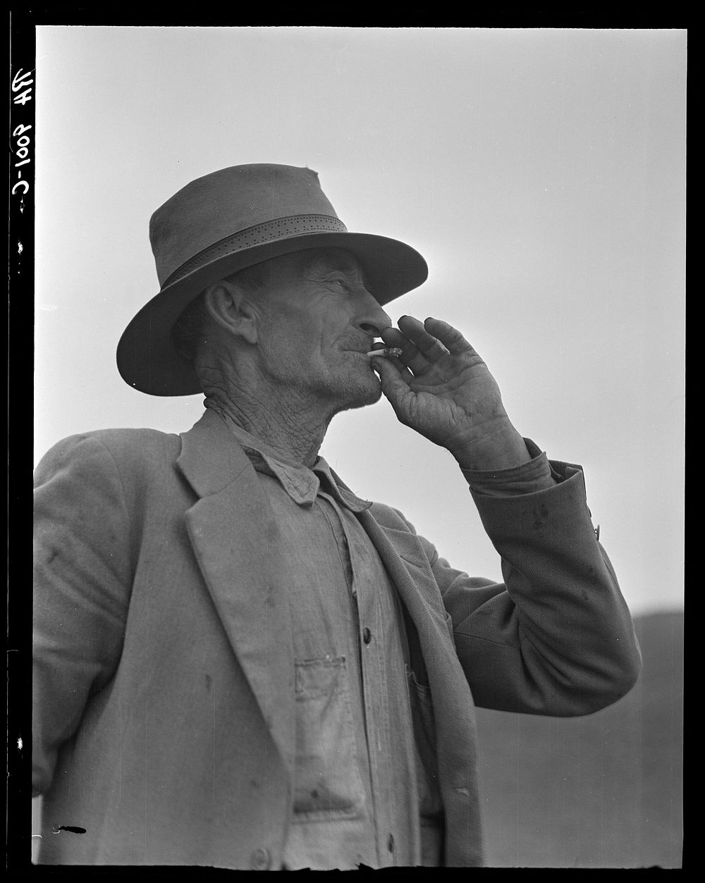 [Untitled photo, possibly related to: This man is a labor contractor in the pea fields of California. "One-Eye" Charlie…