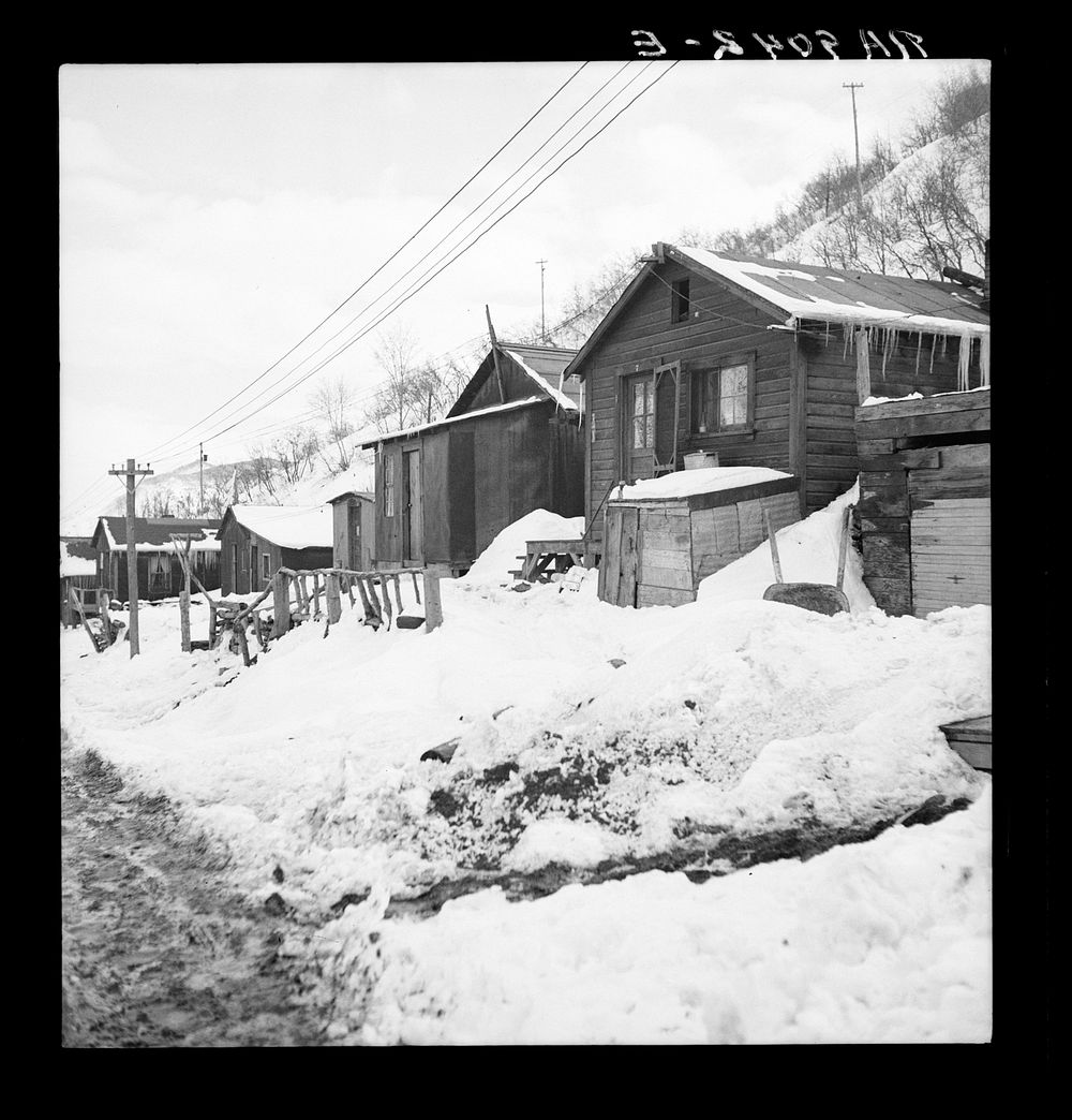 [Untitled photo, possibly related to: Consumers, near Price, Utah. Company housing. Rent approximately eight dollars monthly…