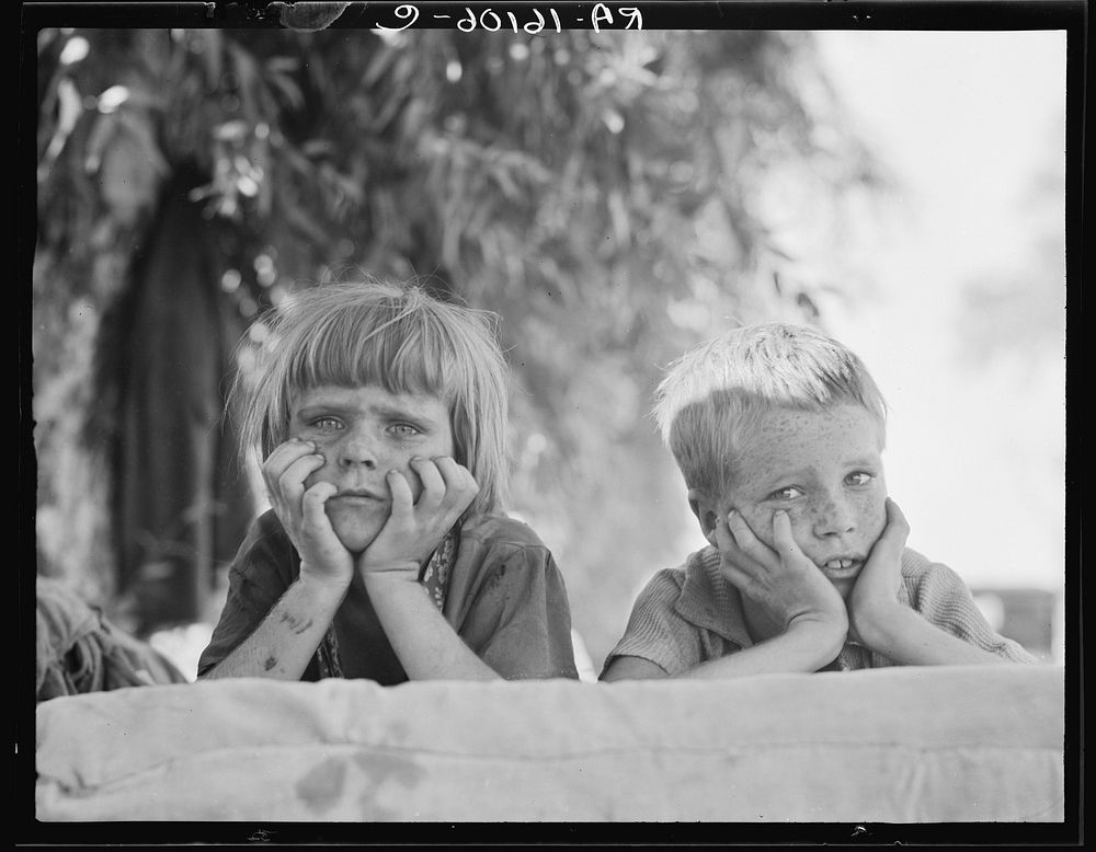 Children of Oklahoma drought refugee in migratory camp in California by Dorothea Lange