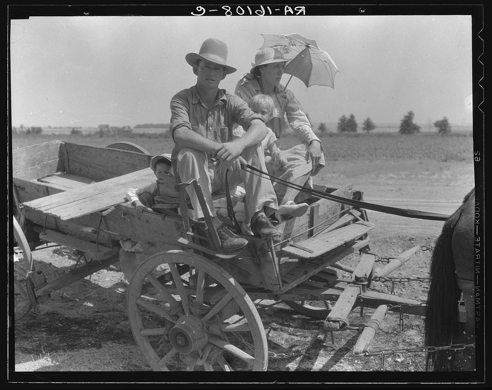 Drought-stricken farmer and family near Muskogee, Oklahoma. Agricultural day laborer. Muskogee County. Sourced from the…