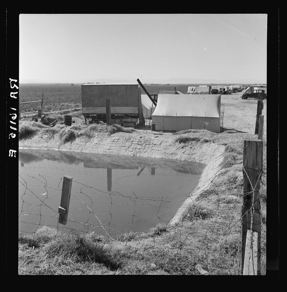 Ditch bank camp for migrant agricultural workers. California. Sourced from the Library of Congress.