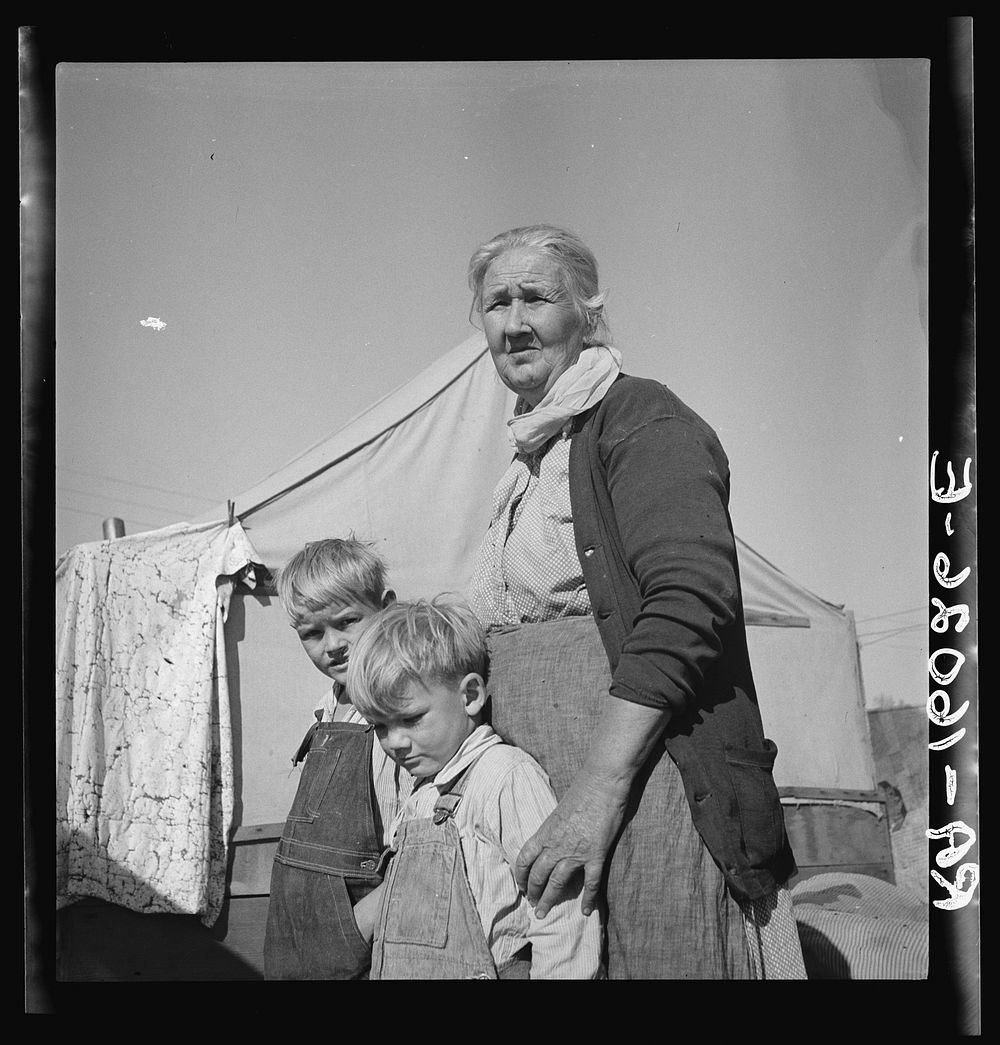 Grandmother of twenty-two children living in Kern County migrant camp. California. Sourced from the Library of Congress.