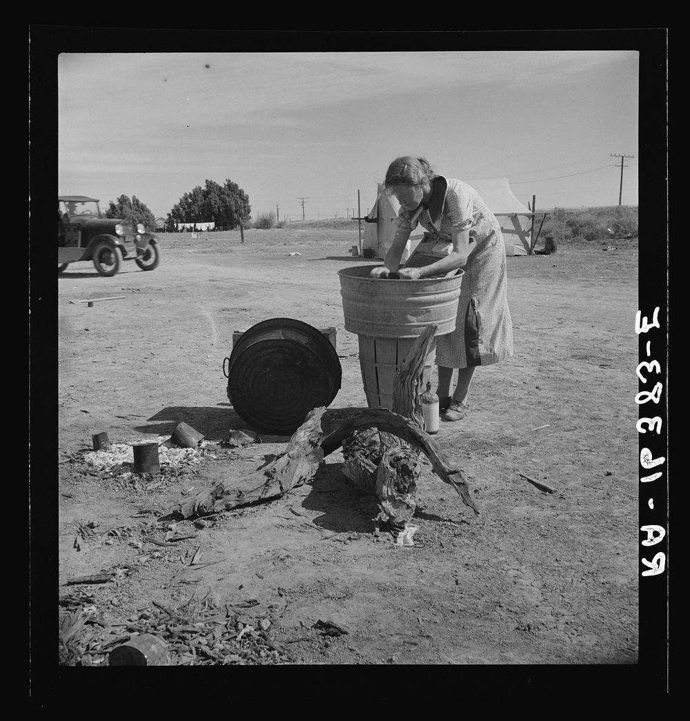 Laundry facilities in migratory labor camp. Imperial Valley, California, near Calipatria. Sourced from the Library of…