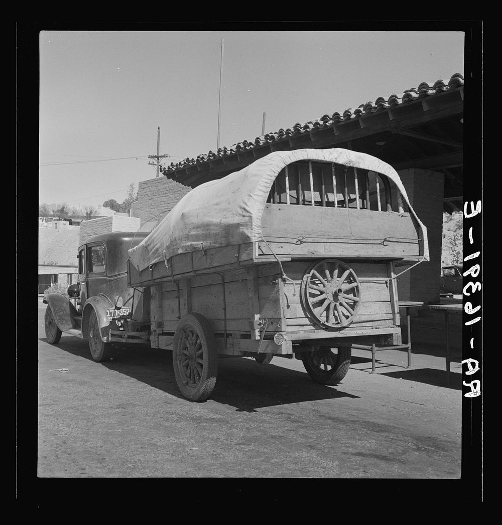 Migrant family stopped at the California-Arizona state line to have their baggage inspected for plant pests. Yuma, Arizona.…