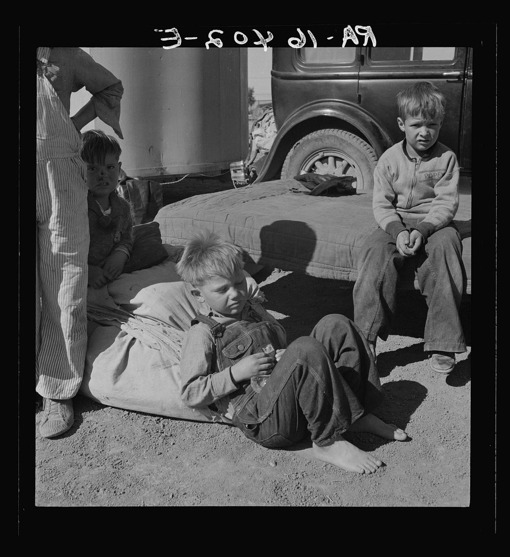 [Untitled photo, possibly related to: Children of Oklahoma migrants in agricultrual workers' camp near Calipatria…