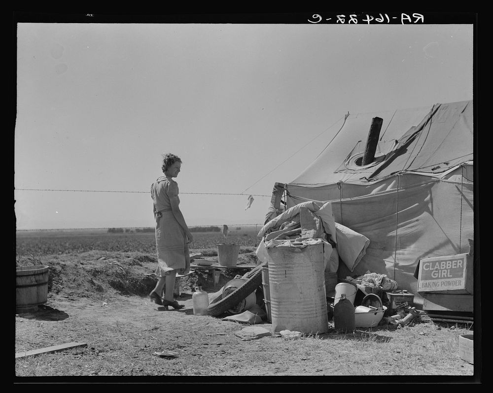 Young family just arrived from Arkansas camped along the road. Imperial Valley, California. Sourced from the Library of…