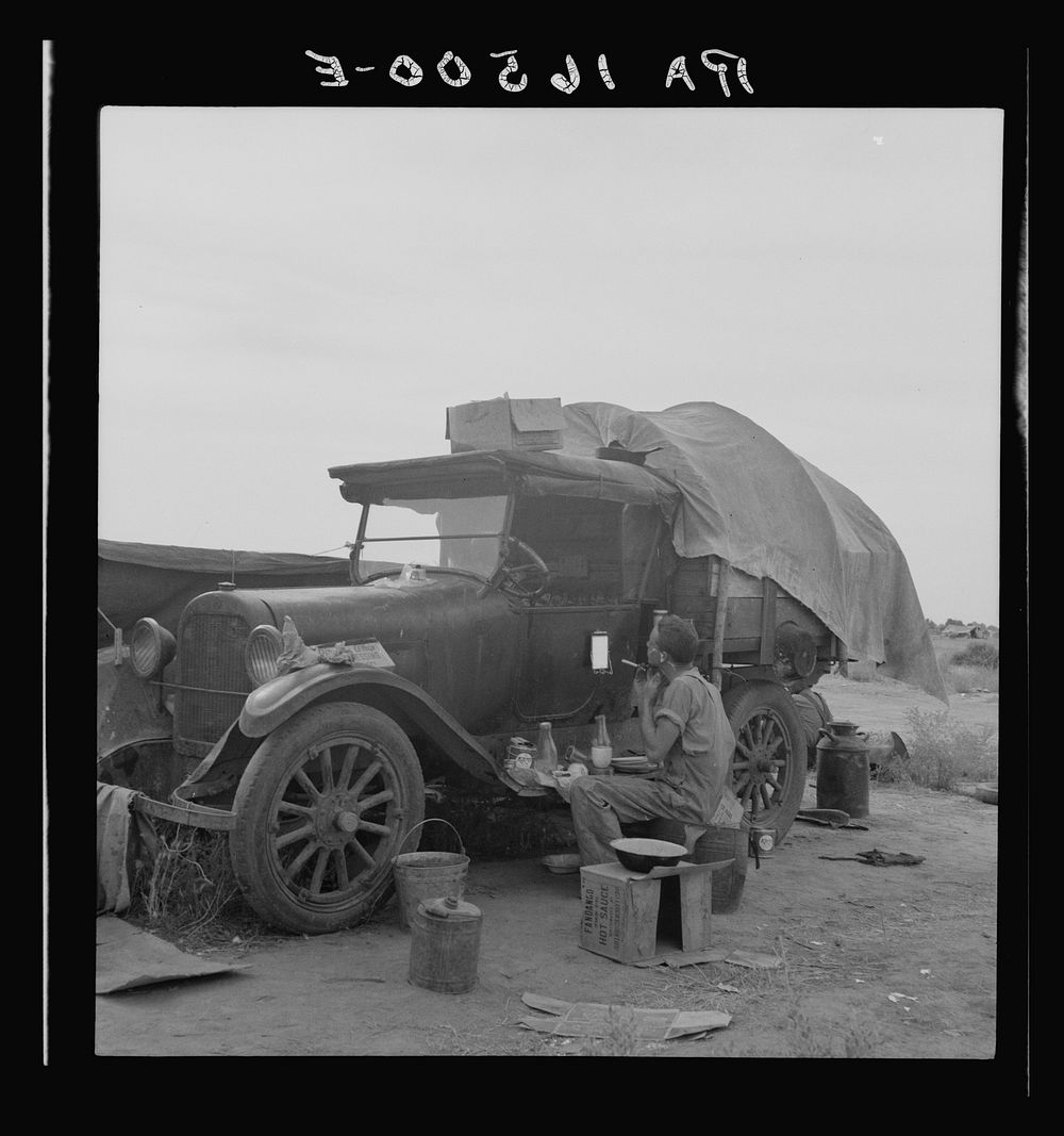 Potato picker in camp near Shafter, California. Sourced from the Library of Congress.
