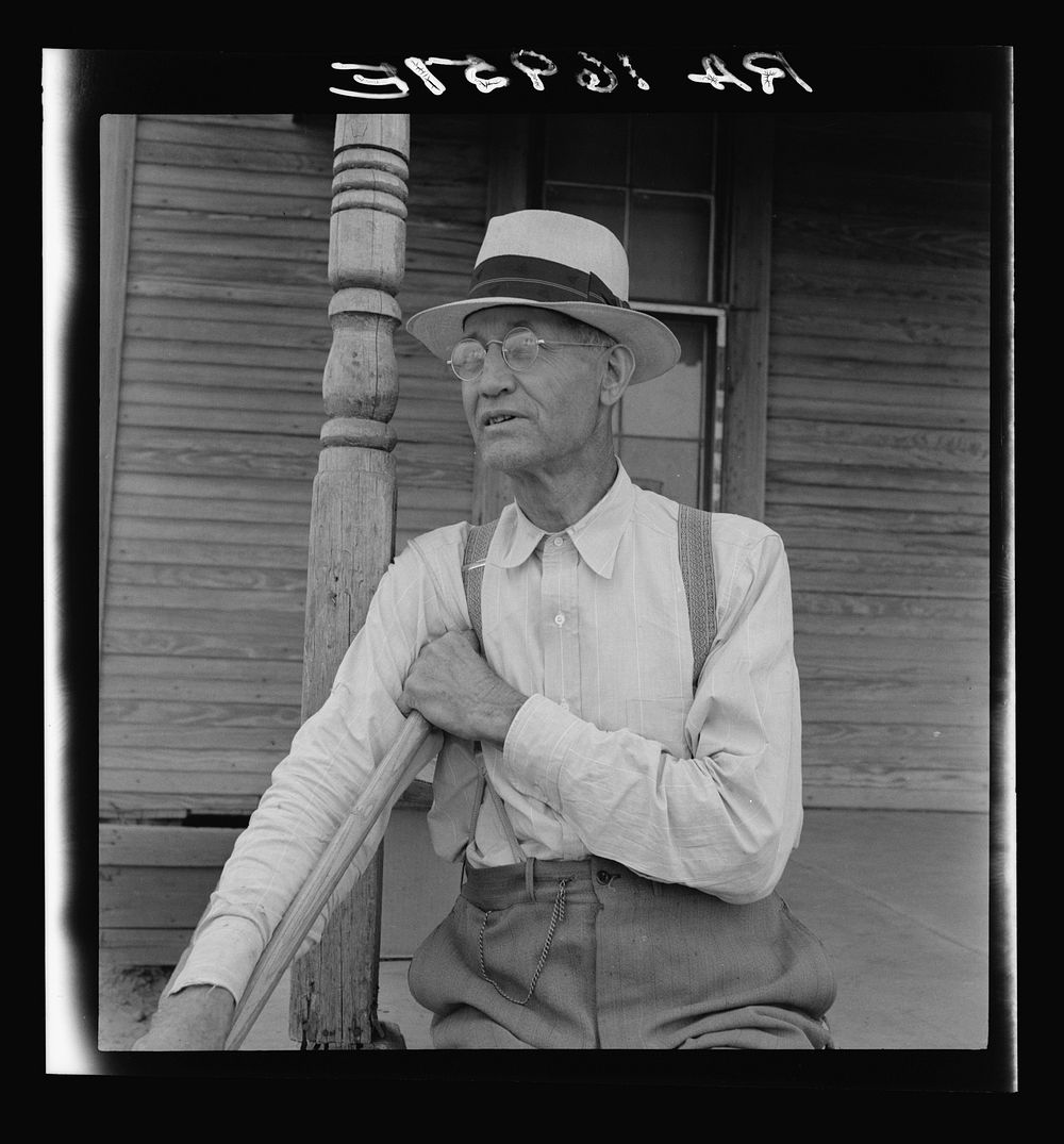 Farm owner near Memphis, Texas. He says, "I'd rather have renters than tractors on my place. I oppose the tractors. It puts…