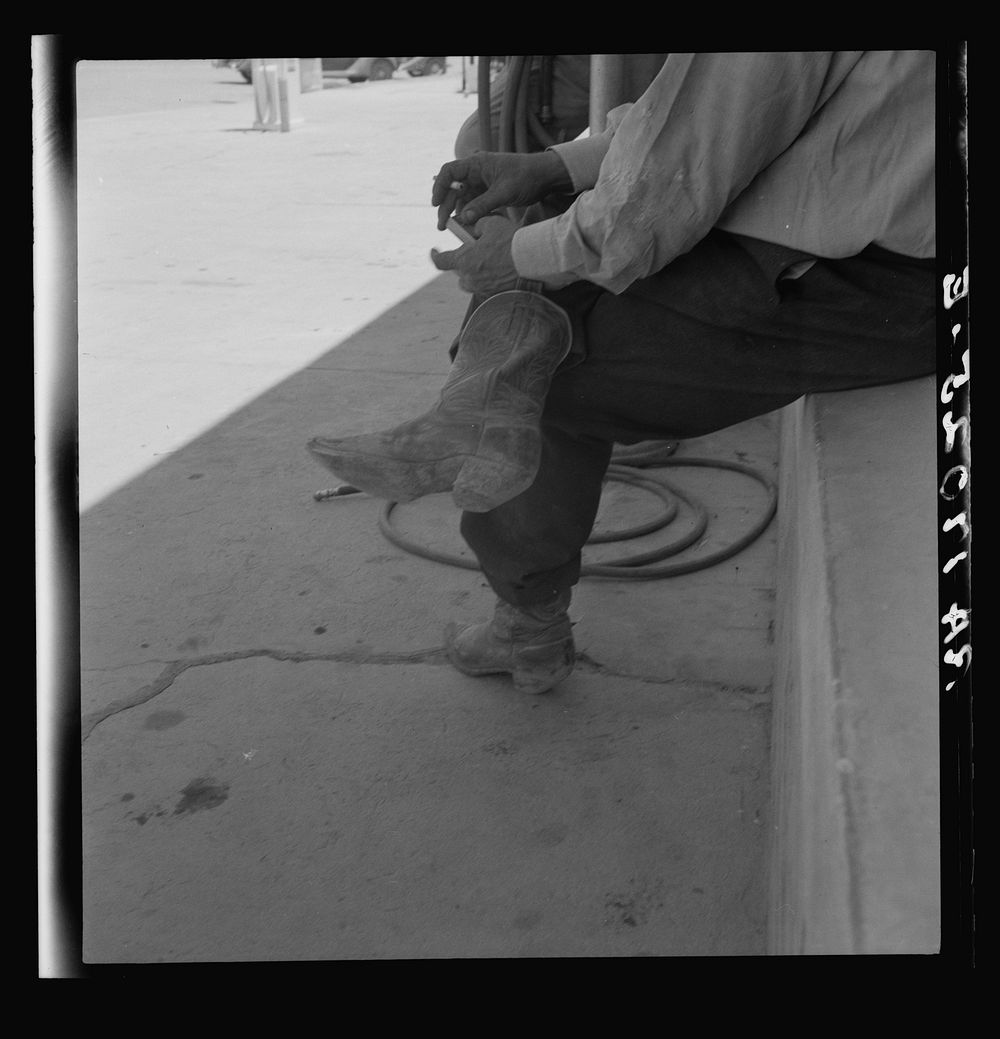 A Texas cattleman is distinguished by the type of boot he wears. Van Horn, Texas. Sourced from the Library of Congress.