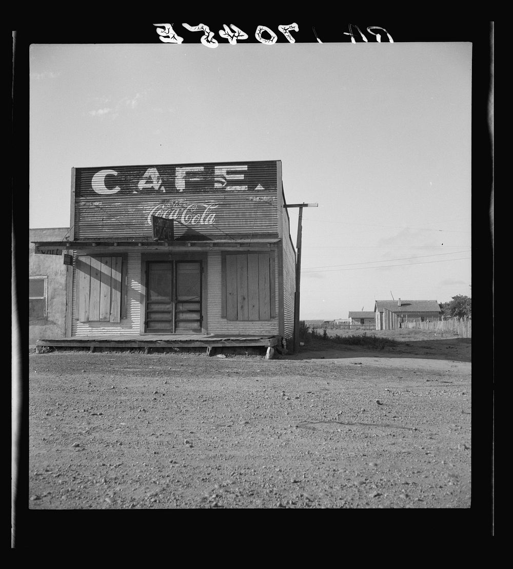 Abandoned cafe in Carey, Texas. Carey is fast becoming a ghost town of the Texas plains. Sourced from the Library of…
