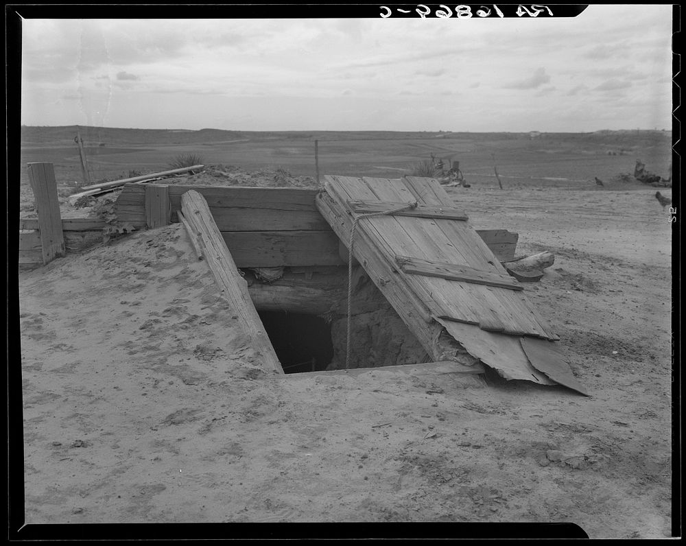 Storm cellar on the Texas plains. West Texas Panhandle. Sourced from the Library of Congress.