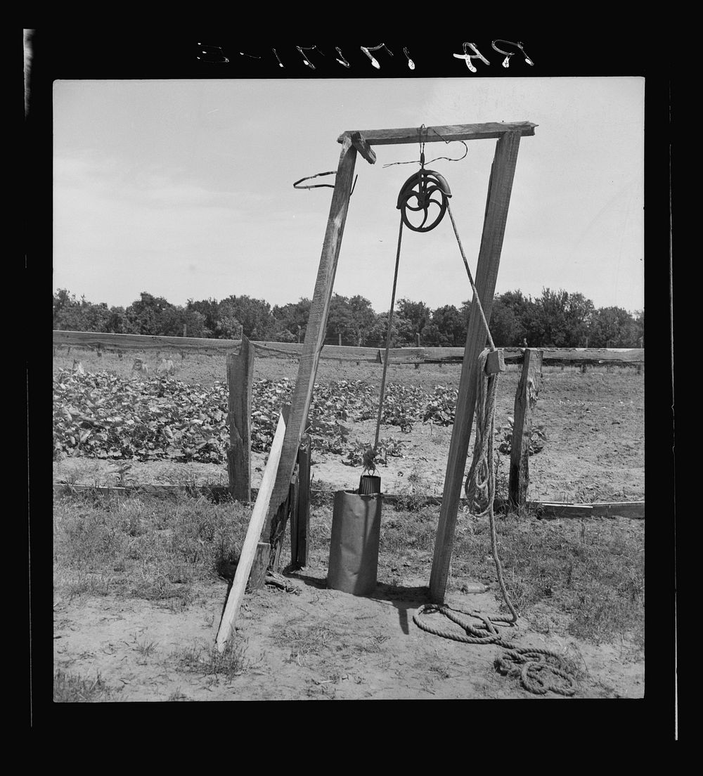 Well, Center County, Oklahoma, belonging to tenant farmer. Sourced from the Library of Congress.