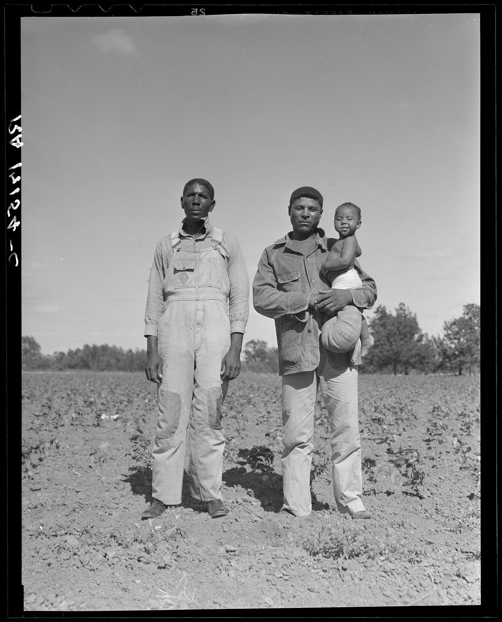 Ex-tenants, now day laborers. Ellis County, Texas by Dorothea Lange
