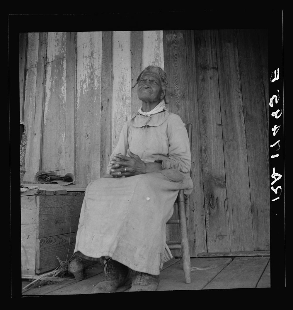 Cotton sharecropper. She was born "two years before the surrender." Mississippi by Dorothea Lange