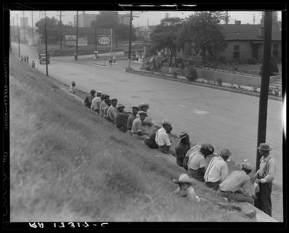 Waiting for the trucks to bring them to the cotton fields. Memphis, Tennessee. Sourced from the Library of Congress.