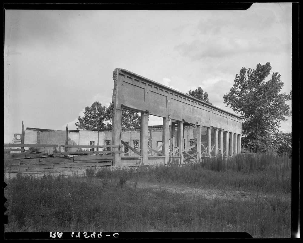 Remains of storefronts in Fullerton, Louisiana, an abandoned lumber town. Sourced from the Library of Congress.
