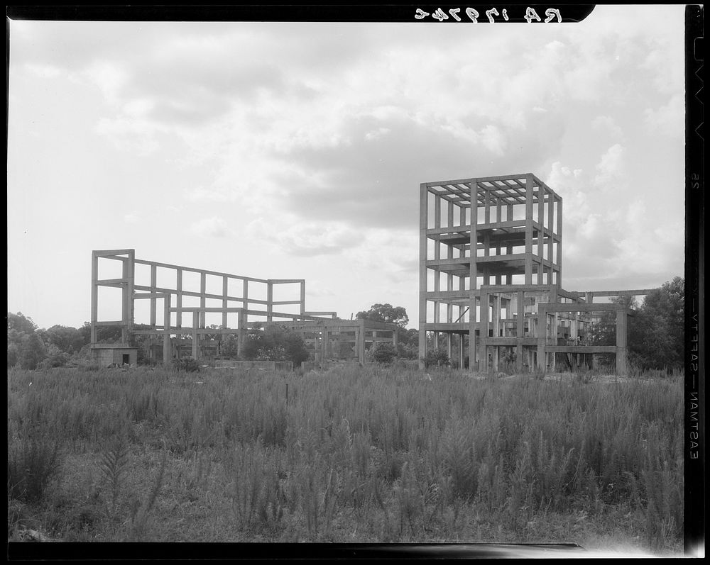 What is left of the alcohol plant, built to utilize refuse. Fullerton, Louisiana, an abandoned lumber town. Sourced from the…