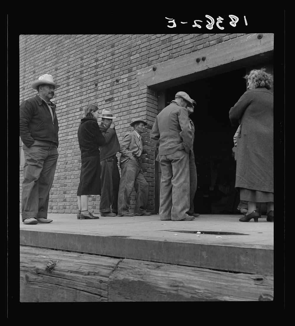 Destitute farm labor families come to Farm Security Administration distributing depot to apply for food grant. Kern County…